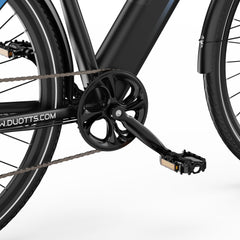 Close-up of a DUOTTS C29 Lite Electric Bike chain and gear system on a white background- Pogo Cycles