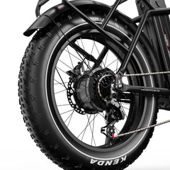 Close-up of a Onesport OT16 MAX Folding Electric bicycle wheel with Kenda tires on a white background