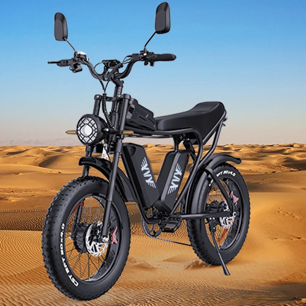 YVY C20 Max Electric Bike in black on sand dunes with a clear blue sky